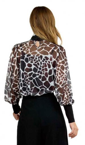 BLUSA ANIMAL PRINT BLANCO Y... 2