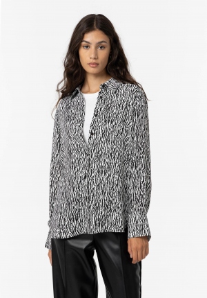 CAMISA FLUIDA ANIMAL PRINT