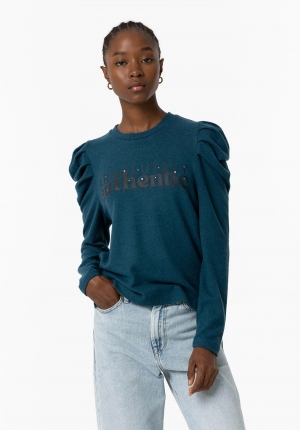 CAMISETA ABULLONADA TACTO...